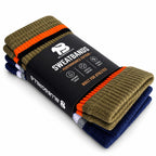 BLUEGORILLA - BLUEGORILLA® Muñequeras de Sudor Deportivas (Sweatbands) · Pack de 2 Pares - Tactical - crossfit, crosstraining, miami, muñequeras, pack, sweatbands, tactical - Two pairs of ribbed BLUEGORILLA sweatbands in olive green and navy, with orange stripes and a black CrossFit training band.