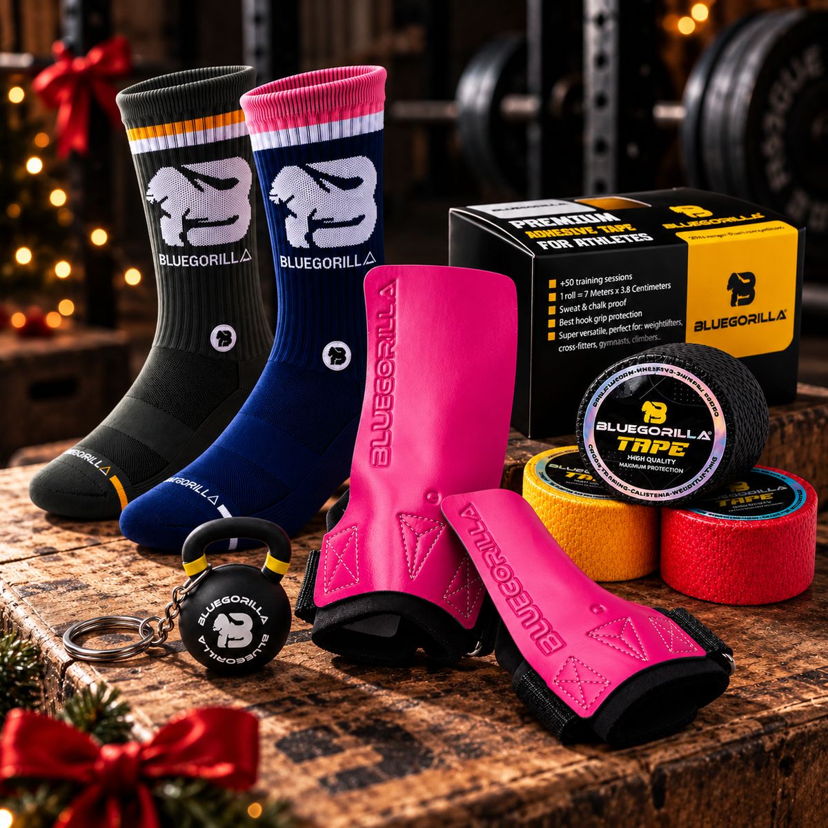 BLUEGORILLA - Pack Primer WOD BLUEGORILLA® · Calleras Competitor 2.0 + Tape (3 rollos) + Calcetines - S-M / M - BlueGORILLA CrossFit WOD set with black grip pads, three red tape rolls, and black, blue, and pink sports socks.